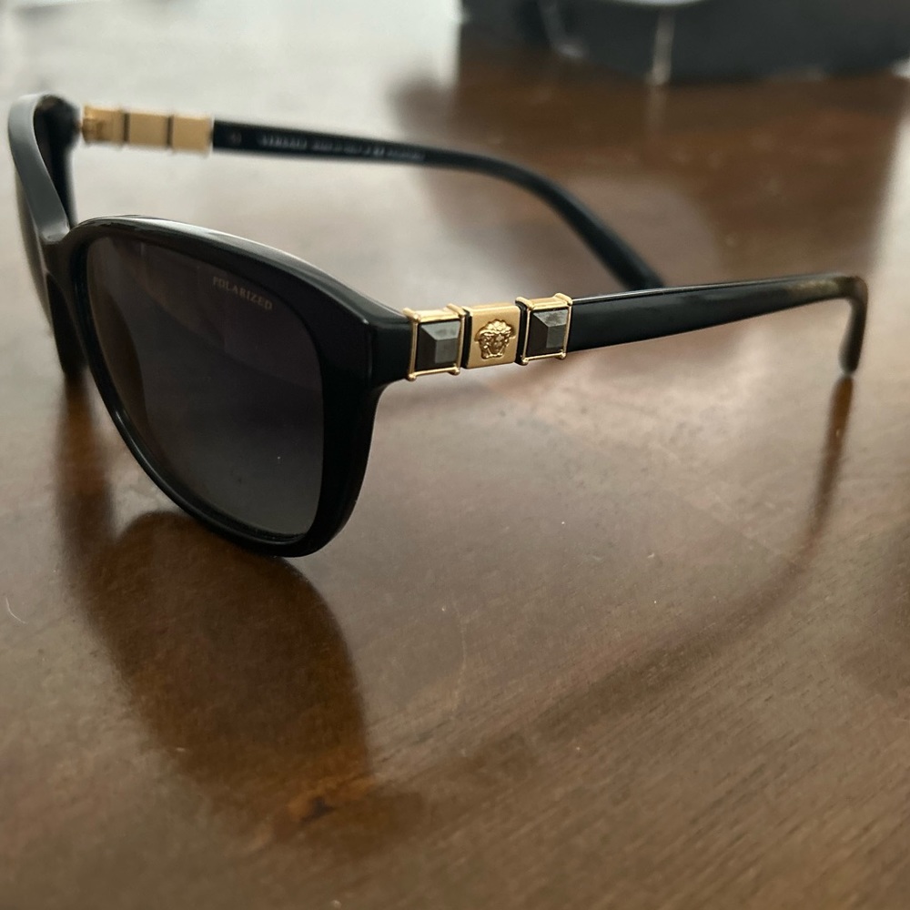 Versace Women's Black w/ Gradient Lens 4293-B
Gold Medusa Logo Cateye Sunglasses